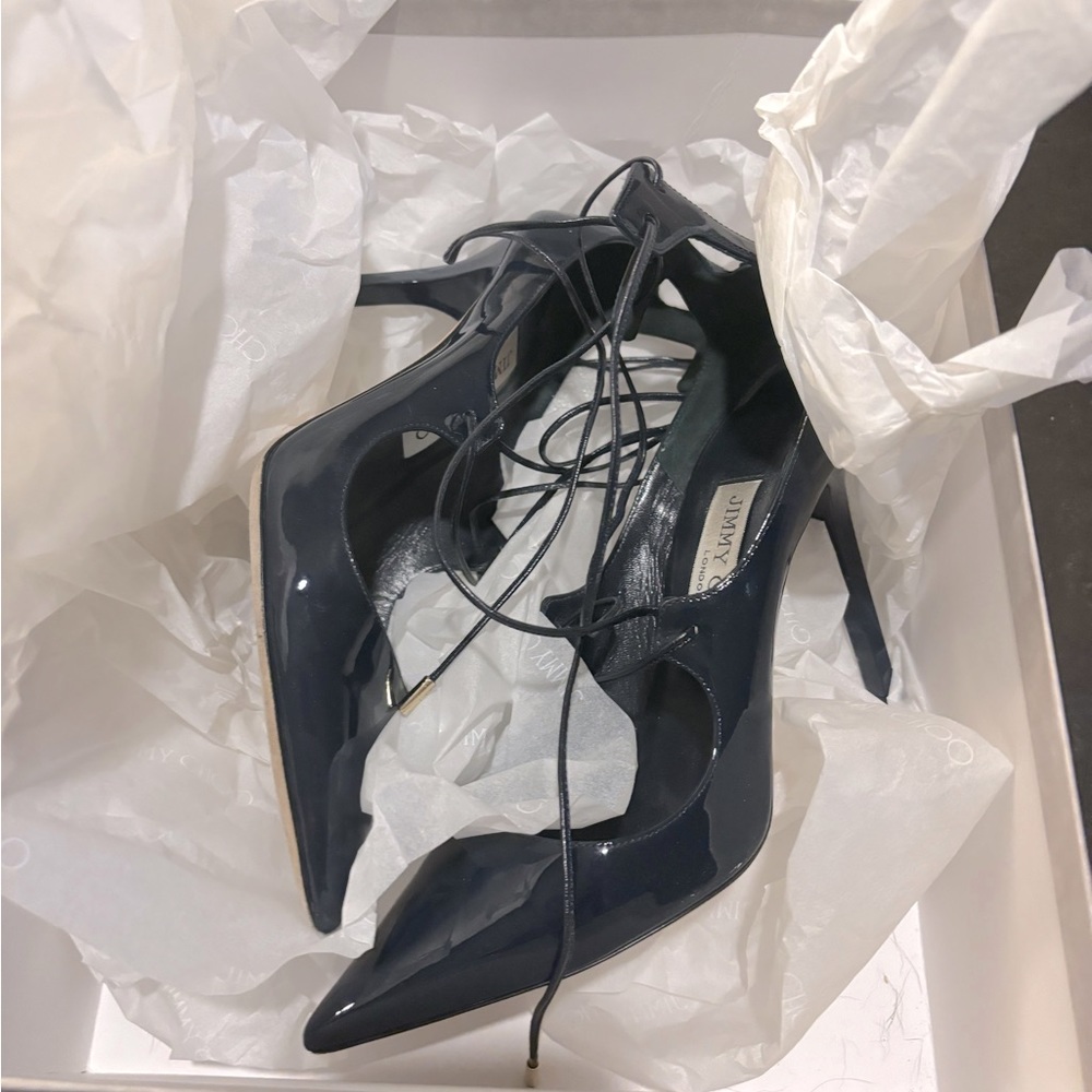 Navy Jimmy choo Vida 100. Heel height is 4”.